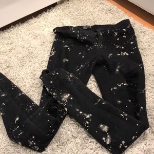 Distressed bleach drip jeans